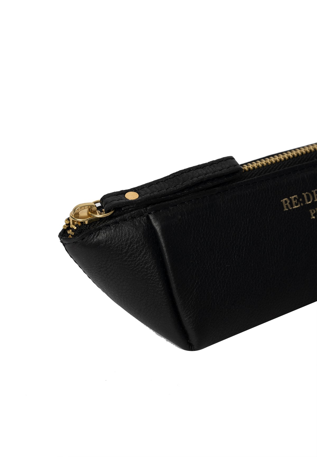 RE:DESIGNED - Project 11 - small triangular leather case
