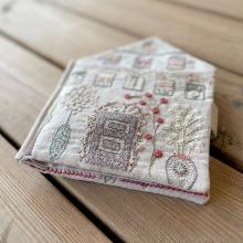 Un Chat dans L'Aiguille - La maison des Brodeuses SAL